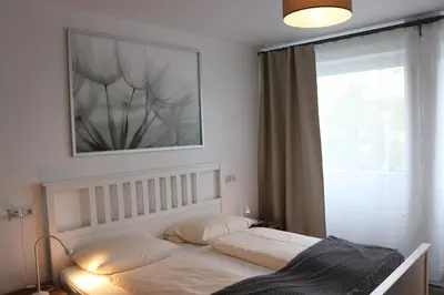 Ein Bett oder Betten in einem Zimmer der Unterkunft Hotel Regina