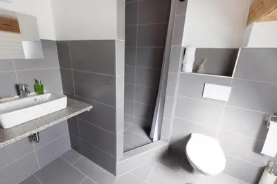 Ein Badezimmer in der Unterkunft Haus am Asang
