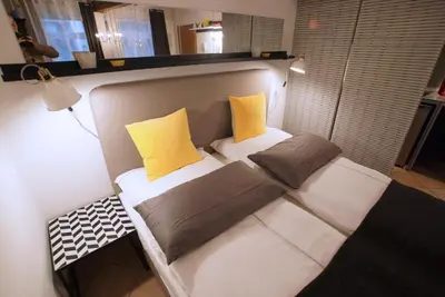 Ein Bett oder Betten in einem Zimmer der Unterkunft Rheintor-Apartment