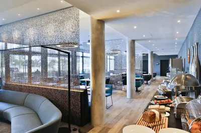 Ein Sitzbereich in der Unterkunft Holiday Inn Express Karlsruhe - City Park by IHG