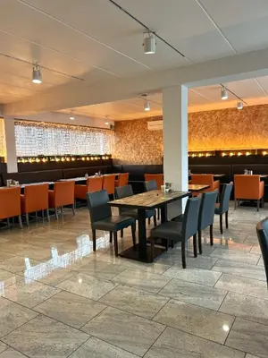 Ein Restaurant oder anderes Speiselokal in der Unterkunft Seehotel Forst