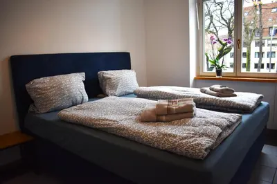 Ein Bett oder Betten in einem Zimmer der Unterkunft Feel at Home 2