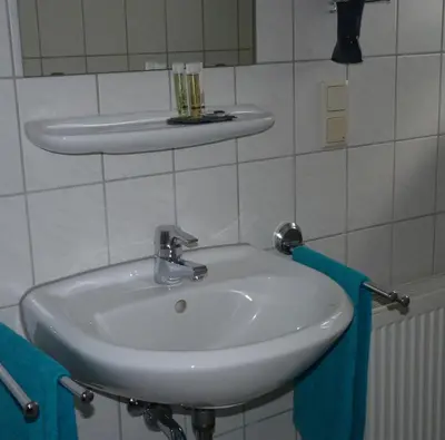 Ein Badezimmer in der Unterkunft Gästehaus Bacchus