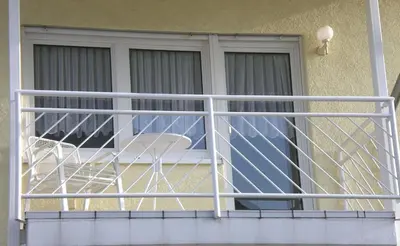 Ein Balkon oder eine Terrasse in der Unterkunft Ferienwohnung Spatzennest