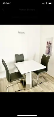 Ein Sitzbereich in der Unterkunft Ferienwohnung Spatzennest