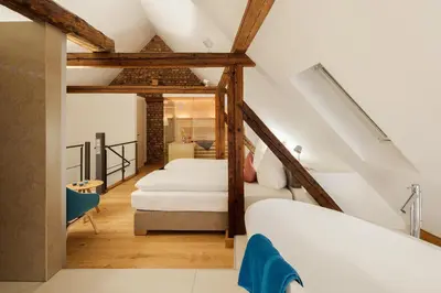 Ein Bett oder Betten in einem Zimmer der Unterkunft Goldkind Feine Wohn- & Schlafstuben