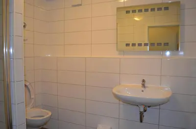Ein Badezimmer in der Unterkunft Zwei Raben Pension