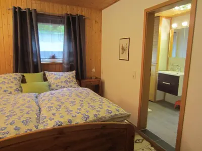 Ein Bett oder Betten in einem Zimmer der Unterkunft FeWo im Studio Wintergarten