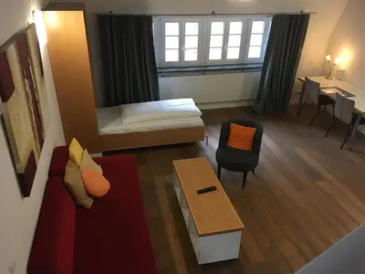 Ein Bett oder Betten in einem Zimmer der Unterkunft Jugendstilhotel Trifels