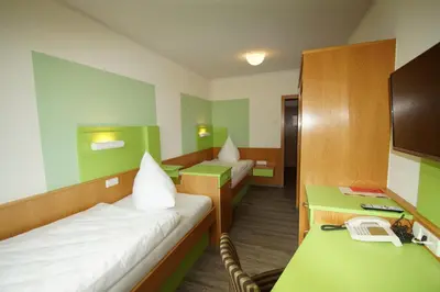 Ein Bett oder Betten in einem Zimmer der Unterkunft Kloster Neustadt