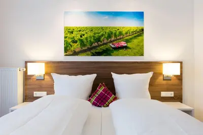 Ein Bett oder Betten in einem Zimmer der Unterkunft SCHLAFGUT Domhof erleben