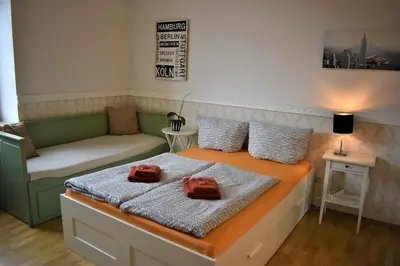 Ein Bett oder Betten in einem Zimmer der Unterkunft Altstadtblick