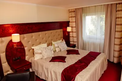 Ein Bett oder Betten in einem Zimmer der Unterkunft Hotel Residenz Babenhausen