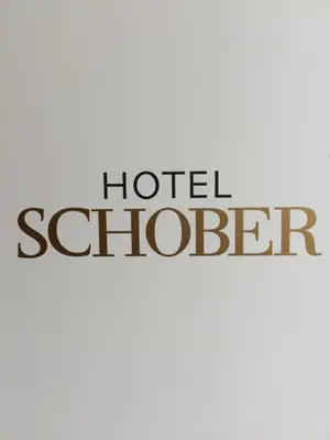 Ein Zertifikat, Auszeichnung, Logo oder anderes Dokument, das in der Unterkunft Hotel Schober ausgestellt ist