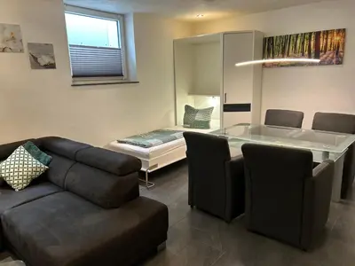 Ein Sitzbereich in der Unterkunft Apartment Mia