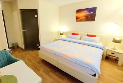 Ein Bett oder Betten in einem Zimmer der Unterkunft Gästehaus Röhm