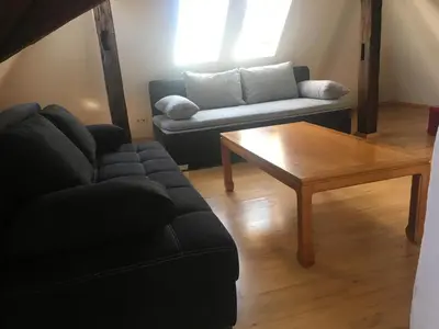 Ein Sitzbereich in der Unterkunft Kaiserslautern Apartment