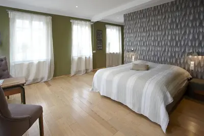 Ein Bett oder Betten in einem Zimmer der Unterkunft Villa Delange