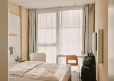 Ein Bett oder Betten in einem Zimmer der Unterkunft Lufthansa Seeheim - More than a Conference Hotel