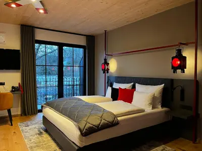 Ein Bett oder Betten in einem Zimmer der Unterkunft Ferienbahnhof Reichenbach