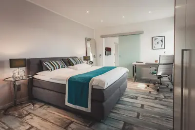 Ein Bett oder Betten in einem Zimmer der Unterkunft O-Apartment