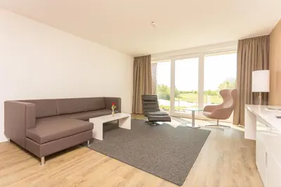 Ein Sitzbereich in der Unterkunft Hotel absolute