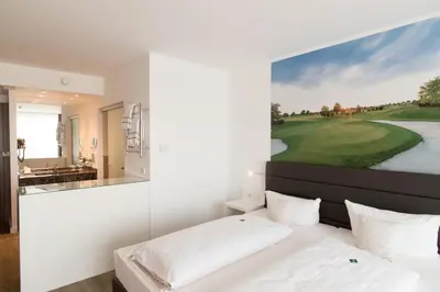 Ein Bett oder Betten in einem Zimmer der Unterkunft Hotel absolute