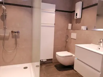 Ein Badezimmer in der Unterkunft Stollis FeWo