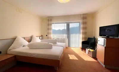 Ein Bett oder Betten in einem Zimmer der Unterkunft Hotel Am Hirschhorn - Wellness - Spa - and more