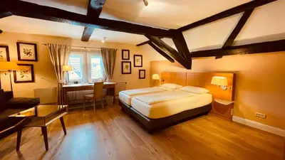 Ein Bett oder Betten in einem Zimmer der Unterkunft Salischer Hof