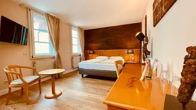 Ein Bett oder Betten in einem Zimmer der Unterkunft Salischer Hof