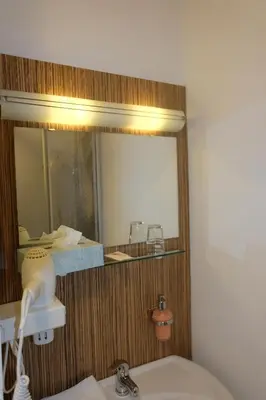 Ein Bett oder Betten in einem Zimmer der Unterkunft Zum Weissen Lamm