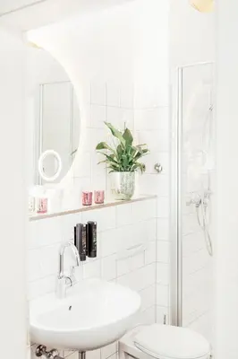 Ein Badezimmer in der Unterkunft Denner Hotel