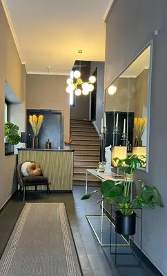 Ein Sitzbereich in der Unterkunft Denner Hotel