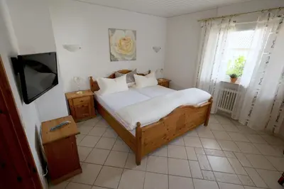 Ein Bett oder Betten in einem Zimmer der Unterkunft Hotel Linde