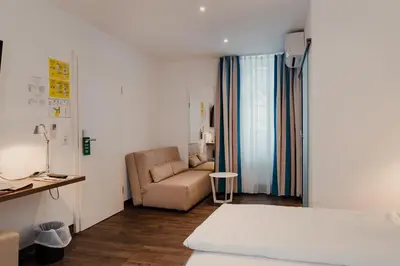 Ein Bett oder Betten in einem Zimmer der Unterkunft Hotel & Gasthaus Backmulde