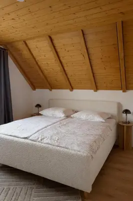 Ein Bett oder Betten in einem Zimmer der Unterkunft Haus am Südfrüchtegarten