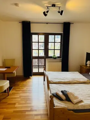 Ein Bett oder Betten in einem Zimmer der Unterkunft Landhaus Magnus