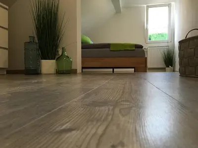 Ein Sitzbereich in der Unterkunft Ferienhaus Zur Mainpforte