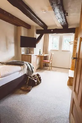 Ein Bett oder Betten in einem Zimmer der Unterkunft Landhotel Lammershof