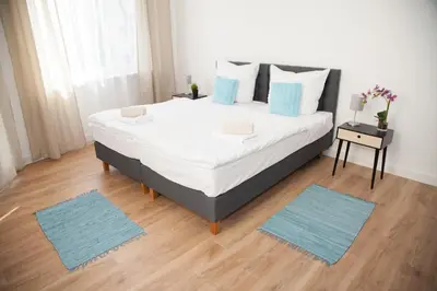 Ein Bett oder Betten in einem Zimmer der Unterkunft Apartment Haus Heidelberg