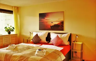 Ein Bett oder Betten in einem Zimmer der Unterkunft Weststadtblick