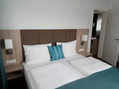 Ein Bett oder Betten in einem Zimmer der Unterkunft Altes Ruderhaus