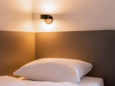 Ein Bett oder Betten in einem Zimmer der Unterkunft B&B Hotel Ludwigshafen