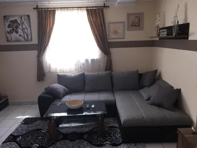 Ein Sitzbereich in der Unterkunft Boulevard Apartment