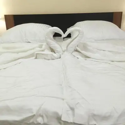 Ein Bett oder Betten in einem Zimmer der Unterkunft Boulevard Apartment