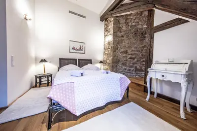 Ein Bett oder Betten in einem Zimmer der Unterkunft Ulner Kapelle