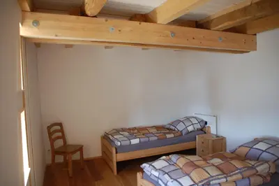 Ein Bett oder Betten in einem Zimmer der Unterkunft Carles Scheunenhof