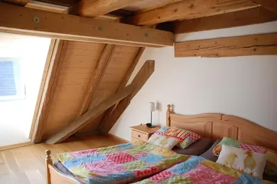 Ein Bett oder Betten in einem Zimmer der Unterkunft Carles Scheunenhof