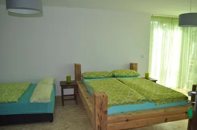 Ein Bett oder Betten in einem Zimmer der Unterkunft Punkrock Harbour Pension Bähr